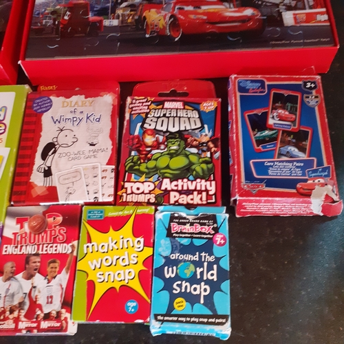 8 - Children's jigsaws and card games collection. Disney pinar cars, top trumps, wimpy kid and others