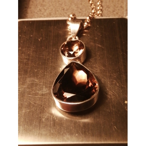 26A - Silver necklace with two large brown gemstones on a very chain 18.54 grams