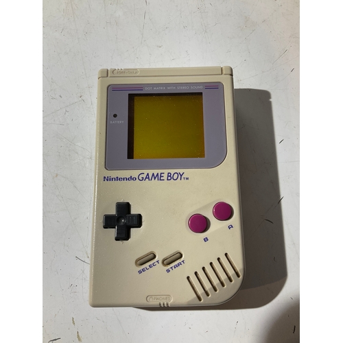 32 - Nintendo Gameboy compact handheld console - with Tetris game - original box - working order