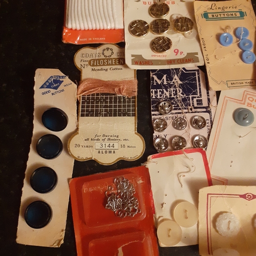 26 - Collection of vintage buttons, eyelets, elastics etc on original cards