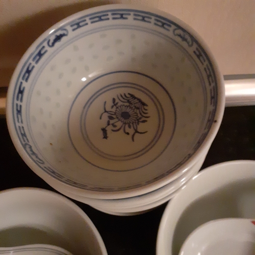 24 - Quantity of Chinese serving dishes and spoons. Various designs. 1980s bought in Singapore.