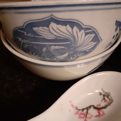 24 - Quantity of Chinese serving dishes and spoons. Various designs. 1980s bought in Singapore.