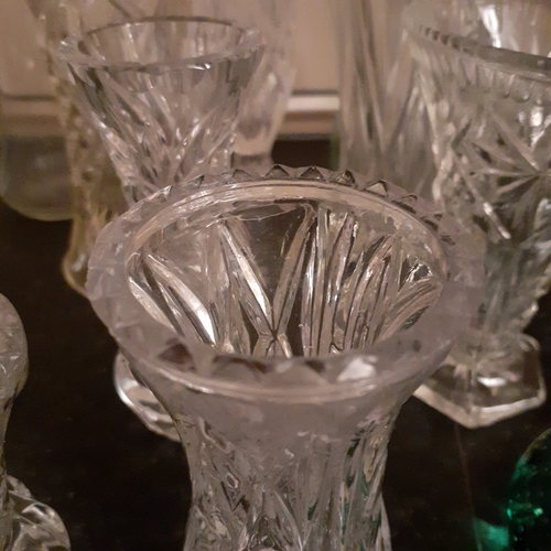 29 - Quantity of glass vases. 16 in total. Including crystal and coloured glass.