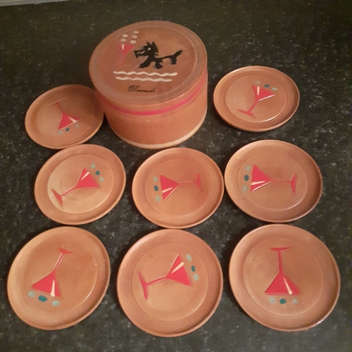 14 - Wooden souviner type coasters in box.