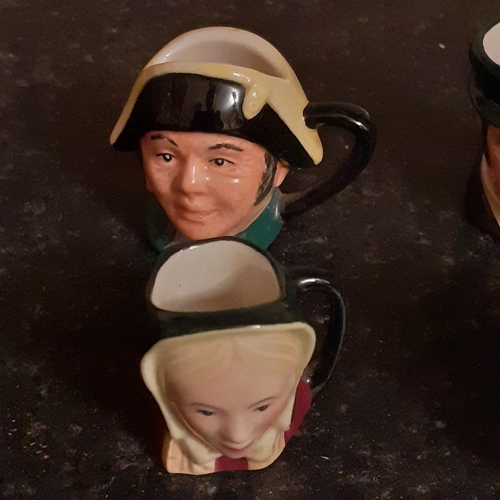 20 - Miniature Royal Doulton Toby Jugs x 7. Charles Duckens, Fagin, Little Nell and more. No damage