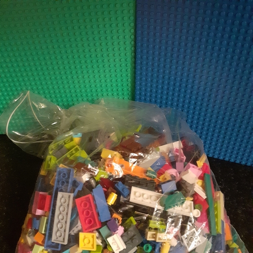 22 - Quantity lego. 1.1kg including car pieces and 2 flat lego bases.