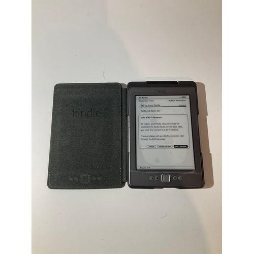 43 - Amazon kindle Paperweight - model D01100
