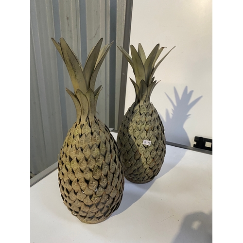 53 - Pair of metal pineapple ornaments - approx 30cm tall
