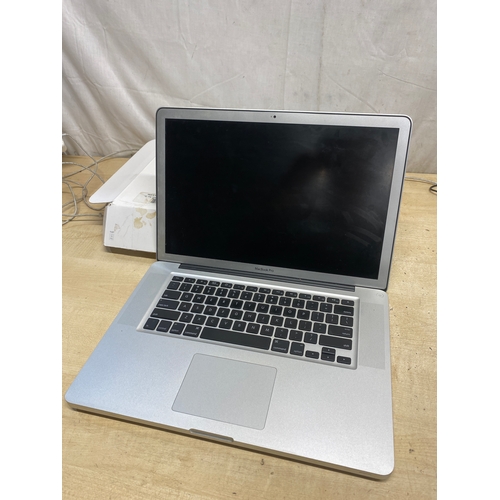 206 - Apple MacBook Pro, i7 processor, 4GB. RAM - no battery or hard drive - sold as spares only