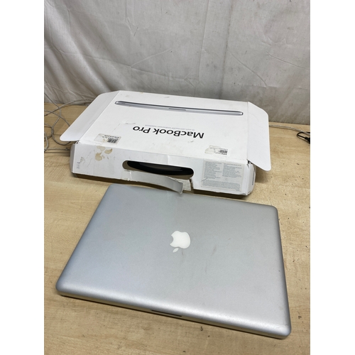 206 - Apple MacBook Pro, i7 processor, 4GB. RAM - no battery or hard drive - sold as spares only