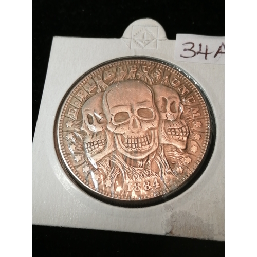 34A - USA silver dollar 1884 with skull design on obverse 26.73 grams of 0.900 silver