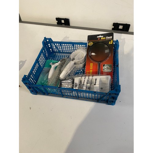 138 - small basket of mixed items including magnifying glass, veg peeler, Masks etc