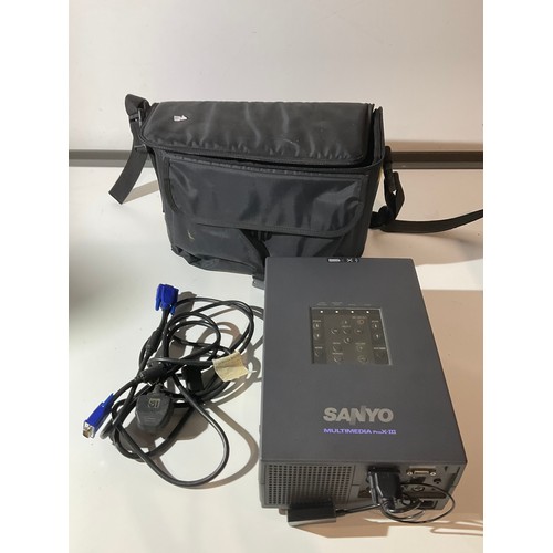 140 - Sanyo projector with leads in carry case