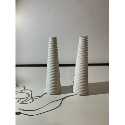 184 - A pair of ribbed conical shaped  white pottery table lights