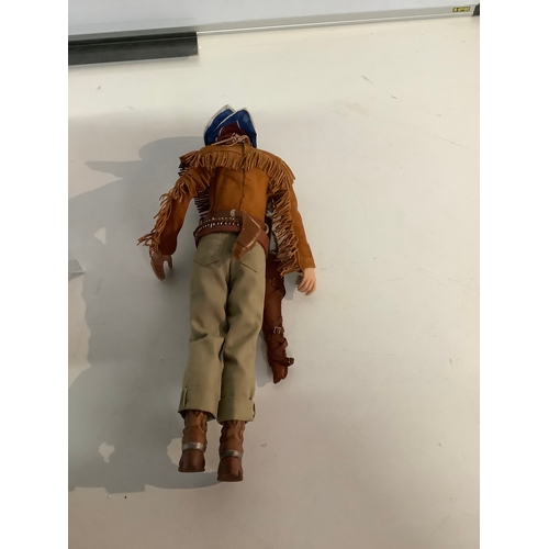 69 - Franklin Mint talking John Wayne figure with plinth & accessories