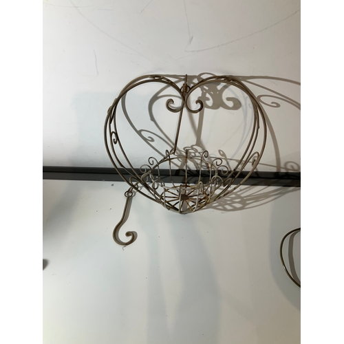 93 - Wrought iron heart shaped hanging planter