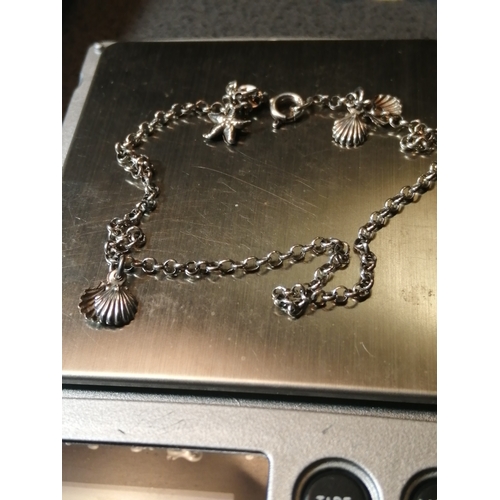 24A - Silver charm bracelet with 3 charms 3.0 grams