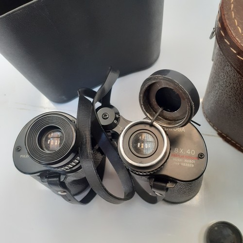 10 - Swift Saratoga binoculars and one other unbranded pair.