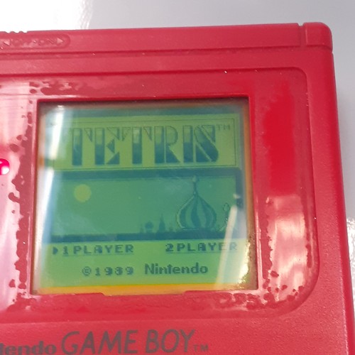 8 - Nintendo game boy. Red. Working. Front screen cover is missing.