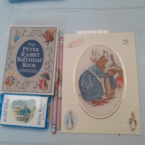 6 - Various Beatrix Potter items including book, 2 pencils, playing cards and a birthday card. Mostly ne... 