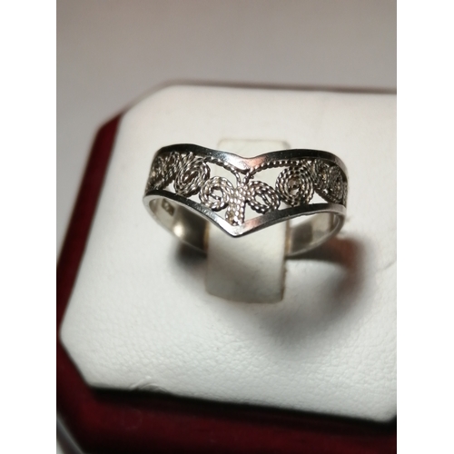 21A - Silver ring with filigree design 1.55 grams Size O