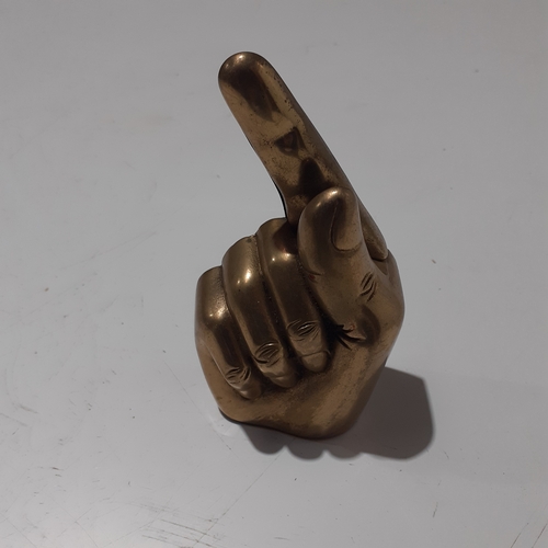 25 - Brass hand pointing finger. Approx 5