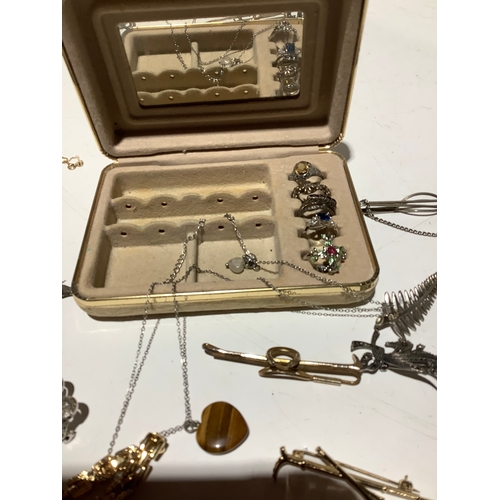 40 - Quantity of Jewellery in box - some silver noted - inc rings & brooches