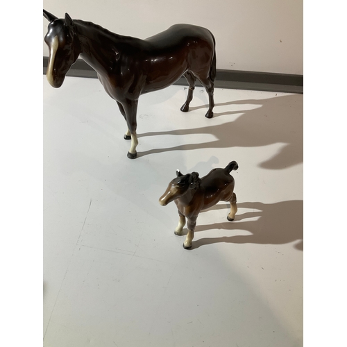 50 - Beswick large & smaller horse - large is 25cm
