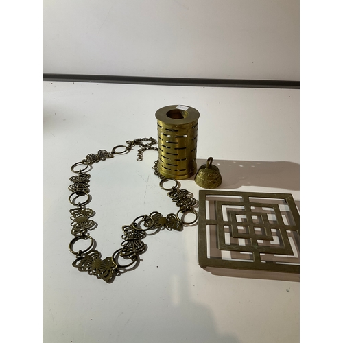 56 - Collection of brassware inc trivet, oil burner & a bell
