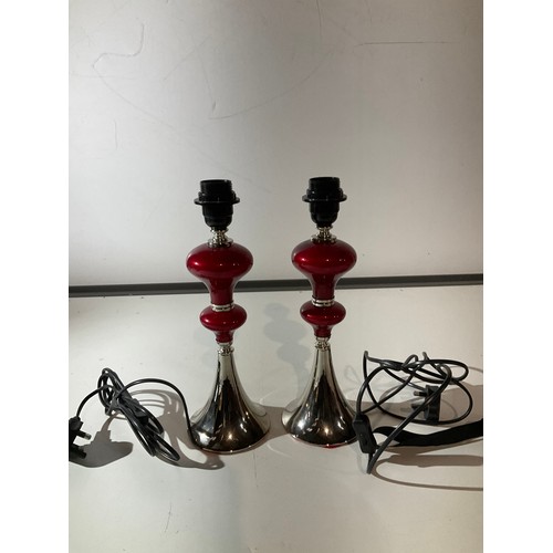 120A - A pair of 2 metal silver and red table lamps