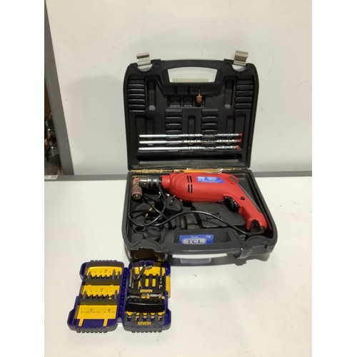 134A - reversible variable speed hammer drill with drill bits incuded in hard carry case