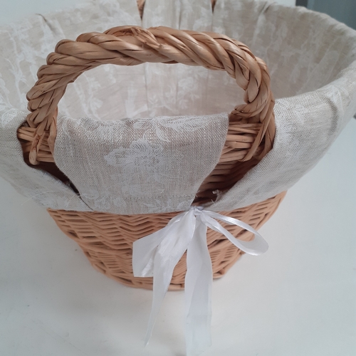 23 - Wicker laundry basket with cloth liner. Good clean condition