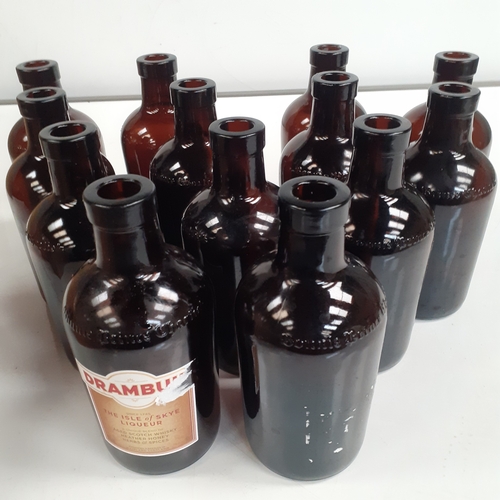 27 - Quantity of brown solid glass multiple purpose  bottles. 560ml with Bonnie Prince Charlie embossed o... 