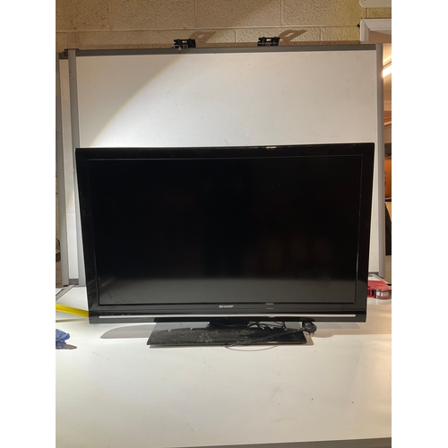 150 - Sharp 40” tv with remote - working