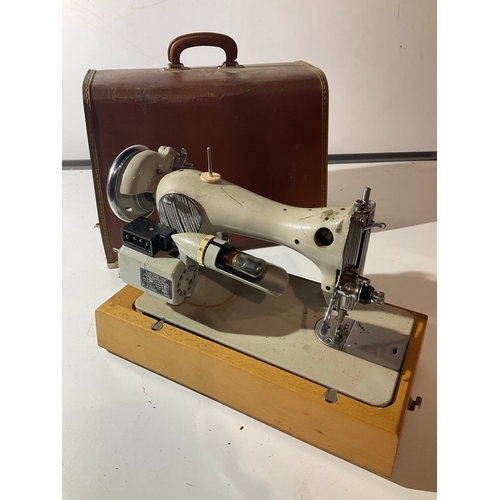 360 - Vintage Jones sewing machine in carry case