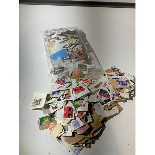 127 - Bag of used postage stamps