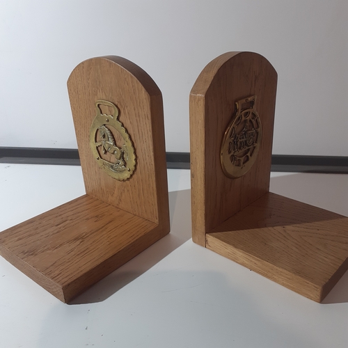 3 - Pair solid wood oak bookends with a horse brass attached