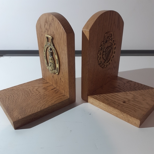 18 - Pair solid wood oak bookends with a horse brass attached