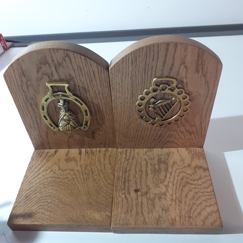 18 - Pair solid wood oak bookends with a horse brass attached