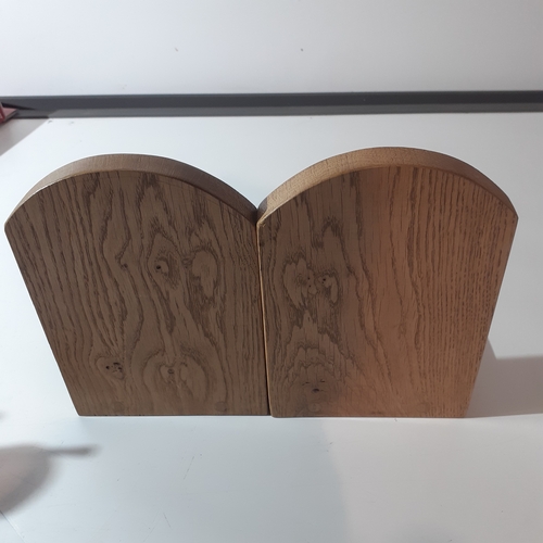 18 - Pair solid wood oak bookends with a horse brass attached