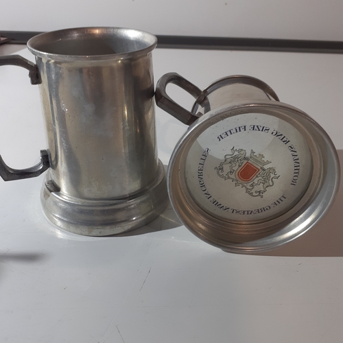 4 - Pair of cigarette advertising metal  tankards. Rothmans cigarettes, advertised on the clear base of ... 