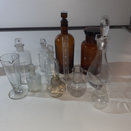 10 - Quantity of interesting medical/measuring bottles, mostly vintage.