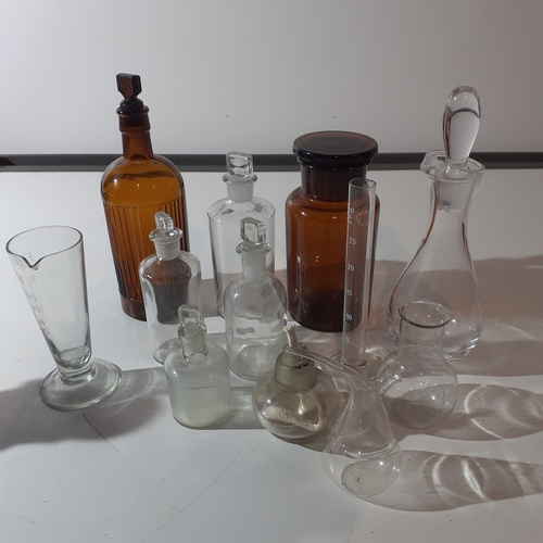 10 - Quantity of interesting medical/measuring bottles, mostly vintage.