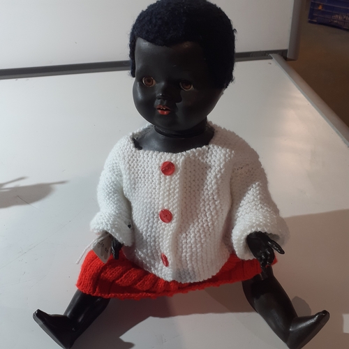 22 - Vintage palitoy hard plastic black doll. Jointed parts, moving eyes etc