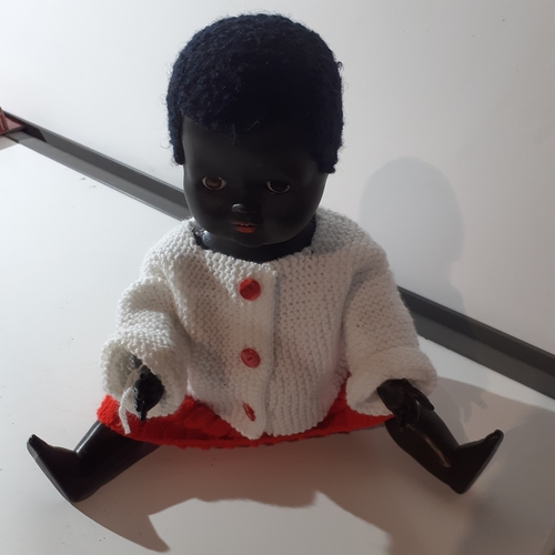 22 - Vintage palitoy hard plastic black doll. Jointed parts, moving eyes etc