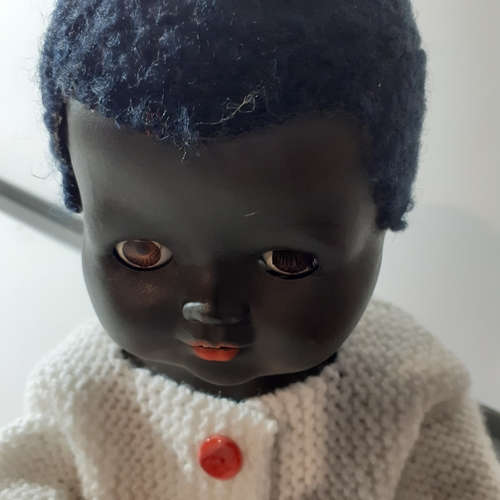 22 - Vintage palitoy hard plastic black doll. Jointed parts, moving eyes etc