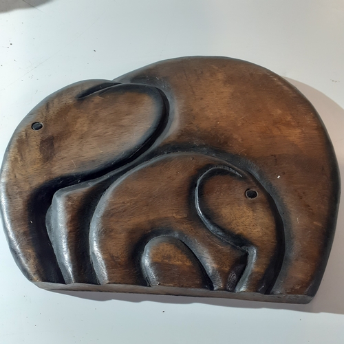 24 - Wooden wall hanging elephant carving.