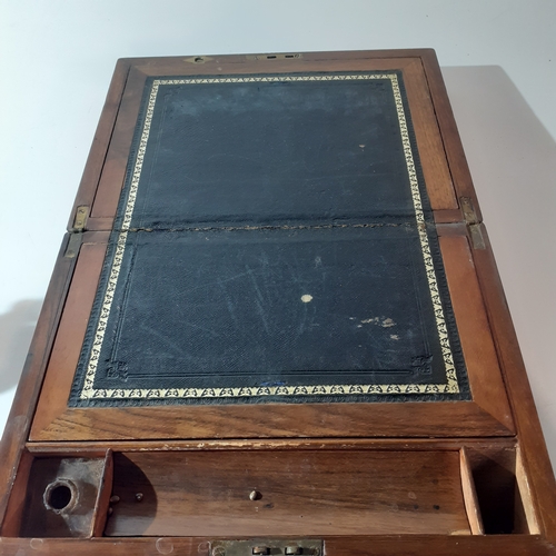 26 - Antique wooden writing slope with inkwell and internal compartments. Brass decorated corners. No key... 