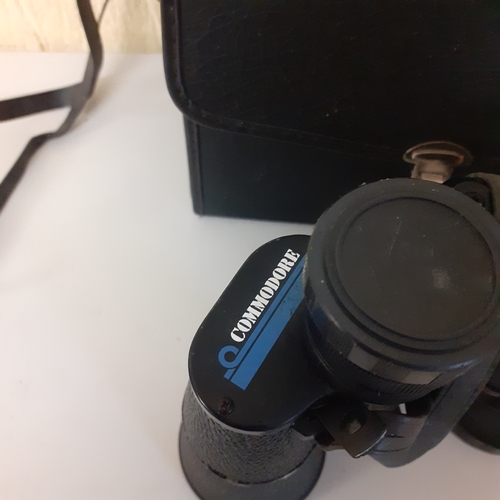 34 - Commodore 10 x 50 wide angle binoculars in case. Working.