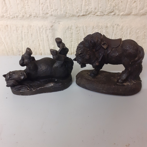 15 - 2 small horse figures. Lots of detail, made from a resin or coal like material.